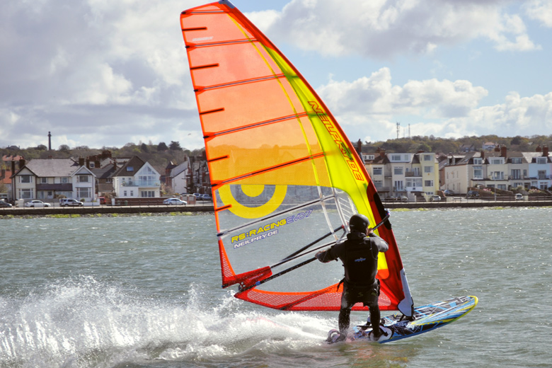 Surfer on West Kirby Marine Lake, Wirral, UK
